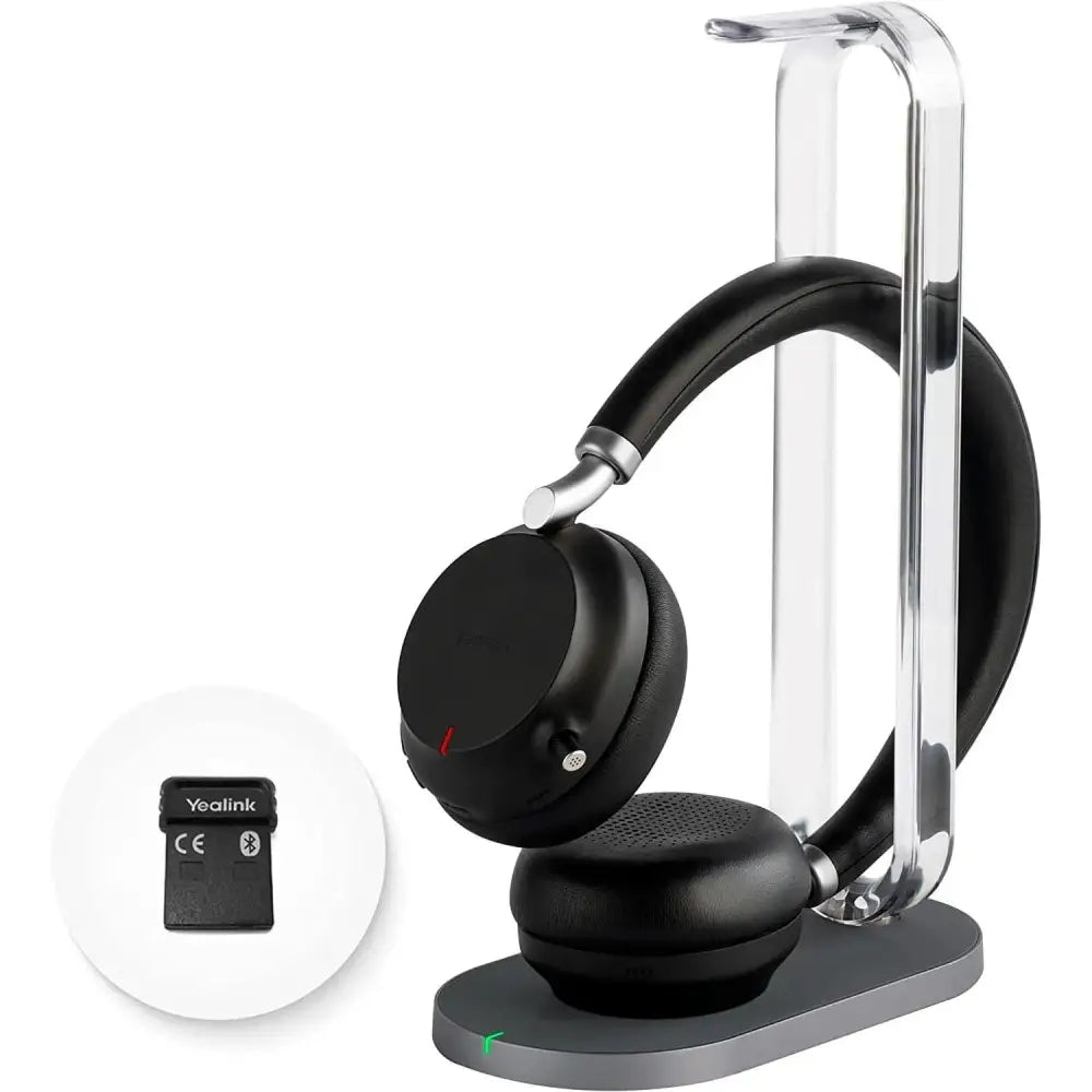 Yealink BH72 Lite black Bluetooth headset on charging station with USB-A dongle