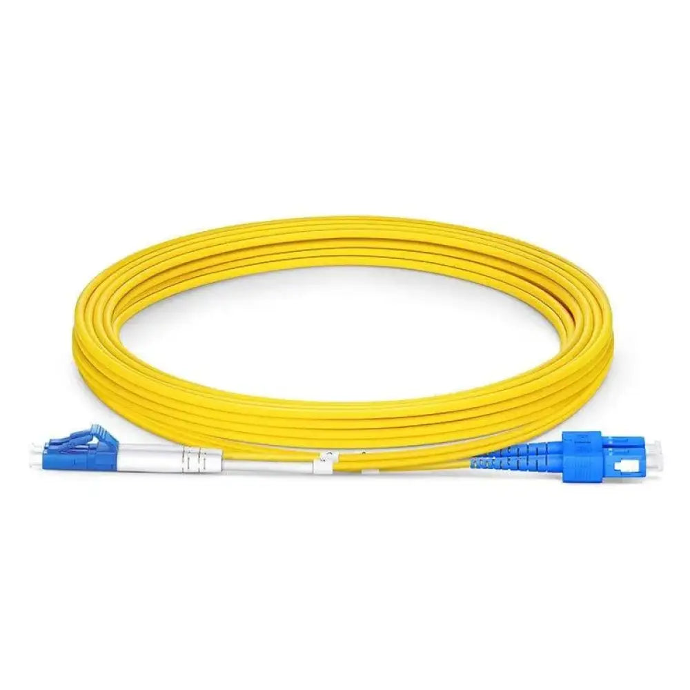 Yellow LC to LC 3m single mode fiber optic cable with blue connectors, coiled