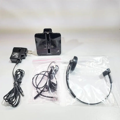 Plantronics CS540 wireless headset set with base, charger, and accessories on white background