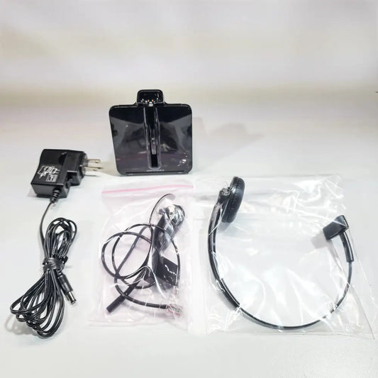 Plantronics CS540 wireless headset set with base, charger, and accessories on white background