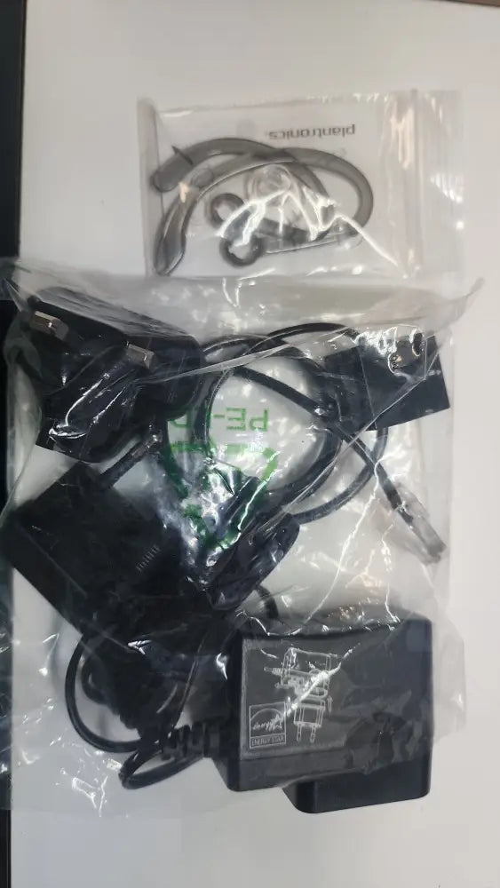 Plantronics Poly CS540 wireless headset accessories including ear hooks, power adapter, cable in packaging