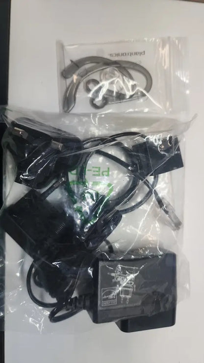 Plantronics Poly CS540 wireless headset accessories including ear hooks, power adapter, cable in packaging
