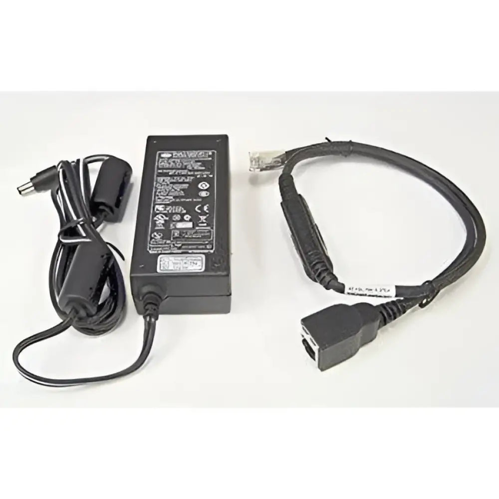 Polycom SoundPoint IP power kit with adapter and ethernet cable on white background