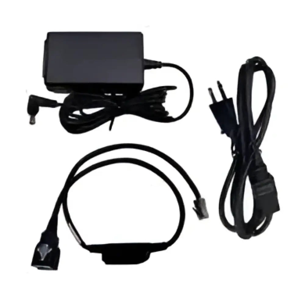 Polycom SoundPoint IP power kit with adapter, power cable, and connector cables on white